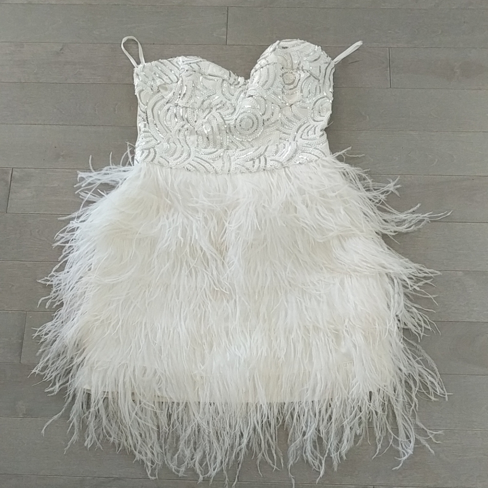 Beautiful white sequence feather dress.